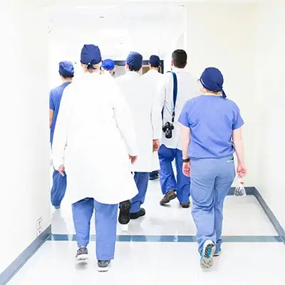 Doctors walking down hallway