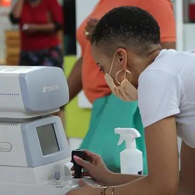 Woman testing eye pressure