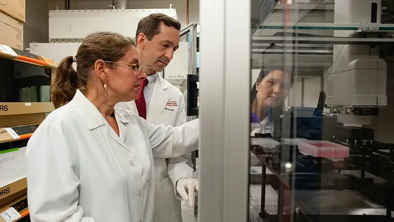 Researchers in lab