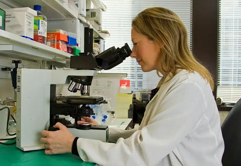 Woman with microscope
